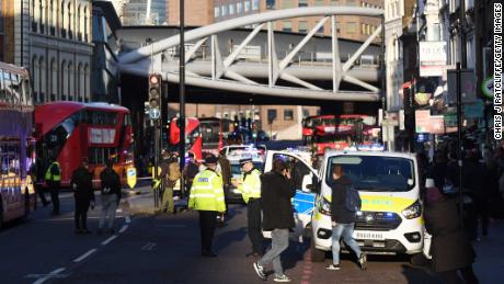 LONDON, ENGLAND - NOVEMBER 29: Traffic is stopped and members of the public are held behind a police cordon near Borough Market after reports of shots being fired on London Bridge on November 29, 2019 in London, England. Police responded to an incident around 2:00 pm local time, followed by reports of gunfire. (Photo by Chris J Ratcliffe/Getty Images)